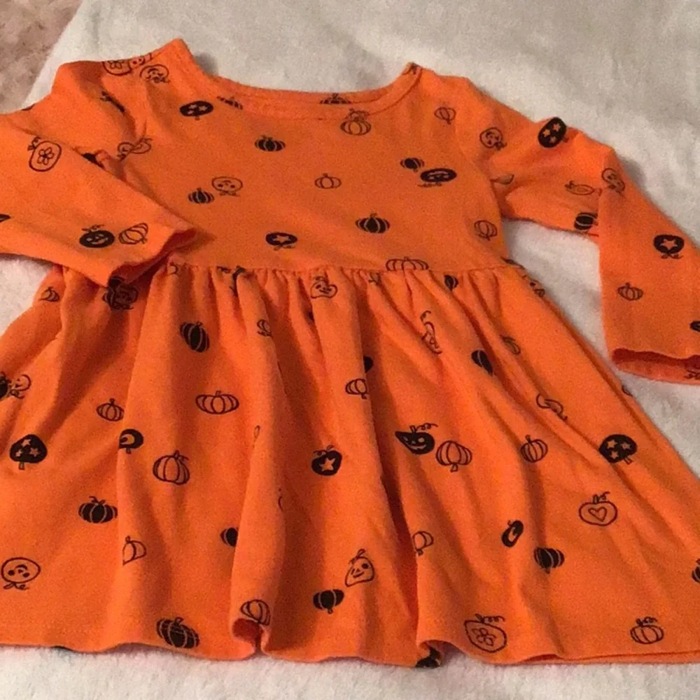 Orange pumpkin print girls dress in a neutral mermaid PJ set